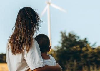 Smiling Statkraft employee with helmet